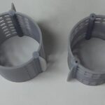 Impresión en 3D de jaulas para pájaros a partir de fotopolímero elástico gris. Pieza impresa en 3D | 3D printing of bird cages from grey elastic photopolymer. 3D printed part